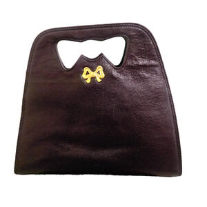 Vintage Scassi Eggplant color leather handbag purse with gold bow made in Italy